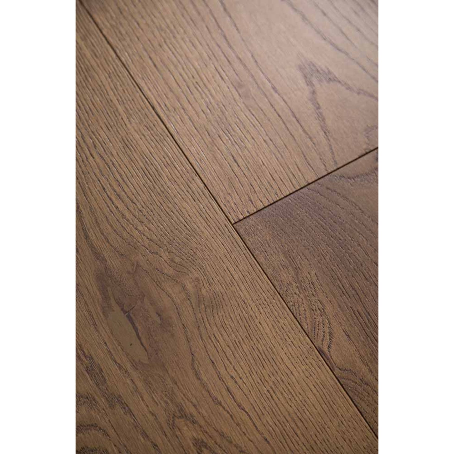 Close-up texture of brushed finish and natural knots on Stella 808 cognac brown oak plank.