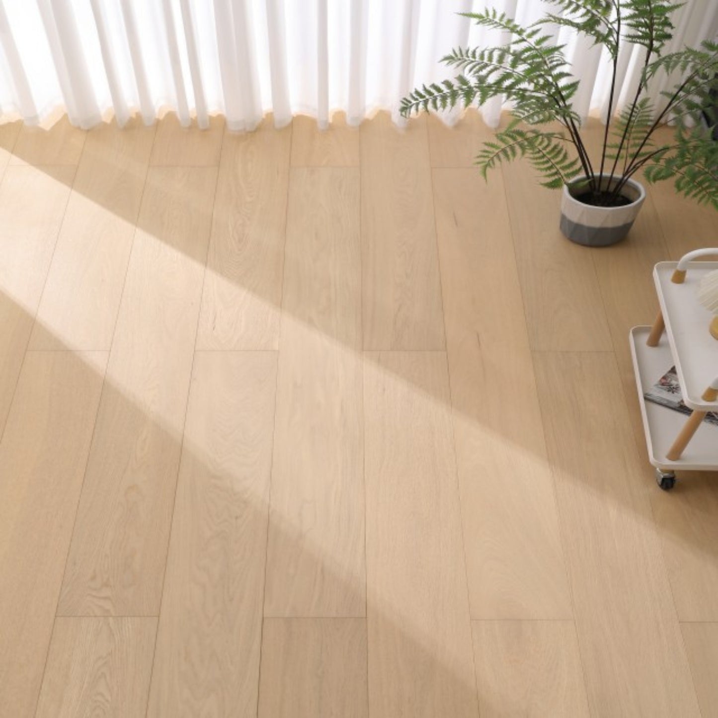 Close-up texture of brushed finish and UV lacquer on Vita 605 warm honey oak plank.