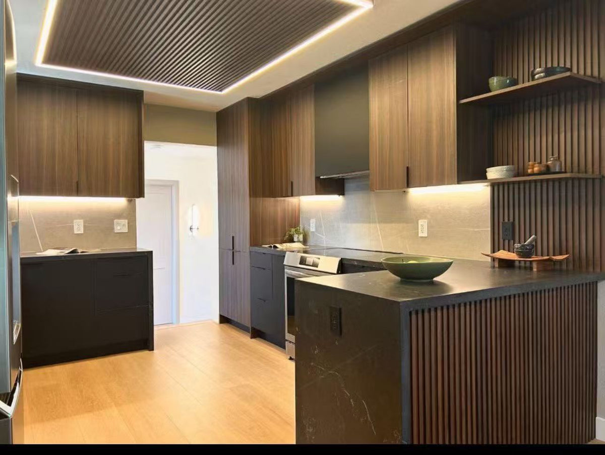 Warm contemporary commercial kitchen design featuring full-overlay Golden Shadow laminate frameless cabinets.