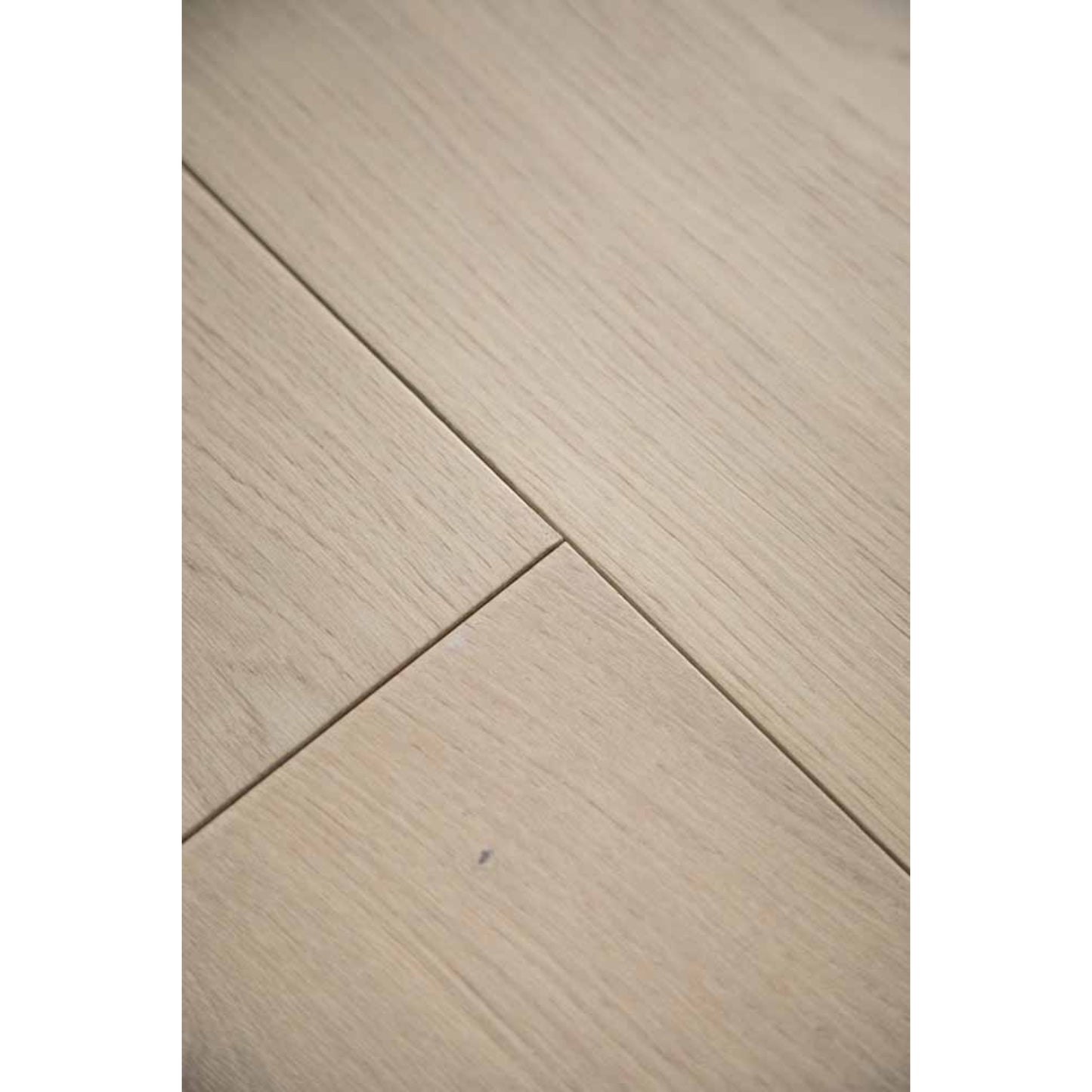 Close-up texture of brushed finish and natural knots on Stella 803 toasted almond oak plank.