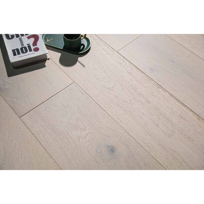Close-up texture of brushed finish and natural knots on Stella 805 vintage barley oak plank.