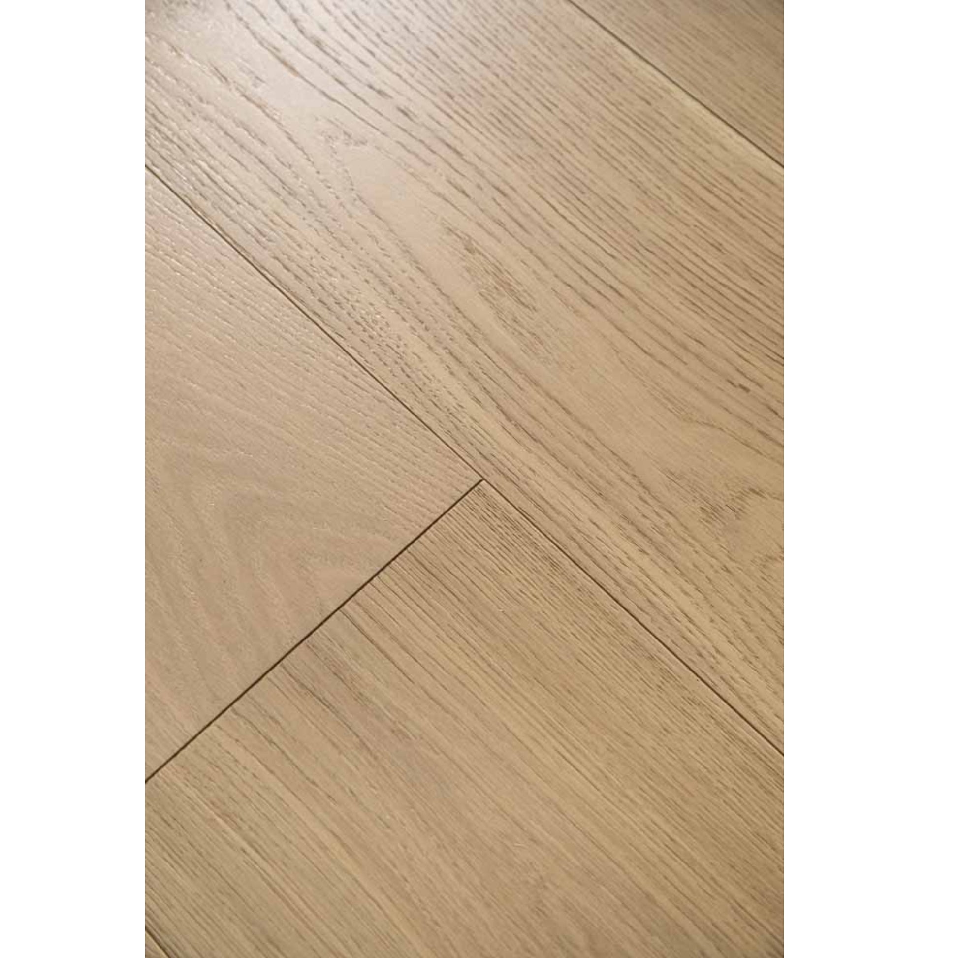 Close-up texture of brushed finish and natural knots on Stella 816 washed distressed greige oak plank.