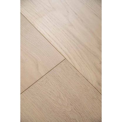 Close-up texture of brushed finish and natural knots on Stella 817 bleached white oak plank.