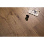 Stella 808 10.24-inch super-wide cognac brown oak engineered wood flooring planks showing character grade.