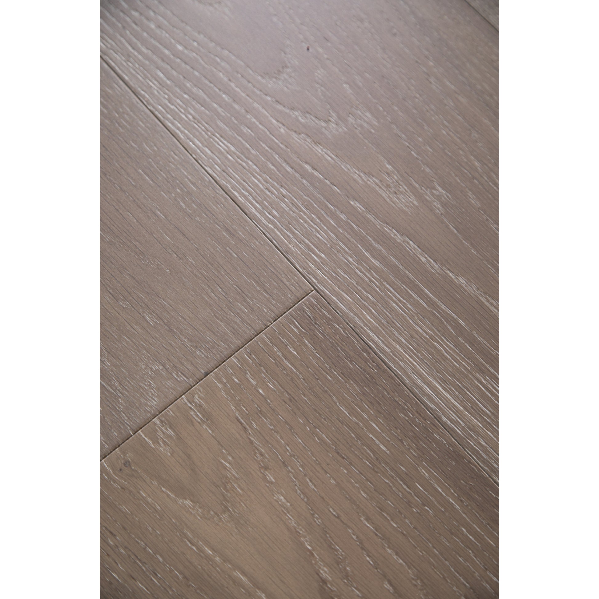 Close-up texture of wire-brushed finish on Vandyck Progettista 112 smoked European oak plank.