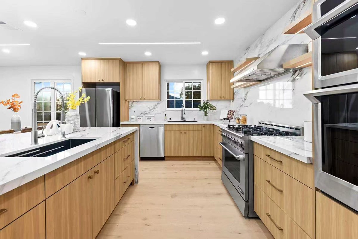 Soft modern commercial kitchen design featuring full-overlay Vanilla Oak laminate frameless cabinets.