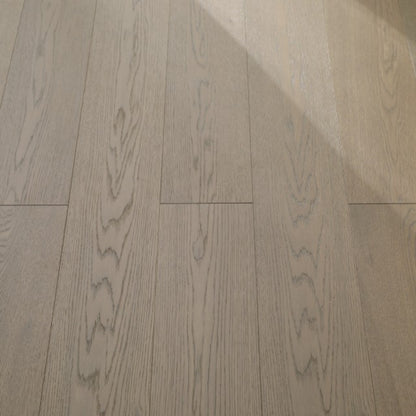 Vita 608 wire-brushed ash blonde European oak engineered wood flooring planks showing select grade.
