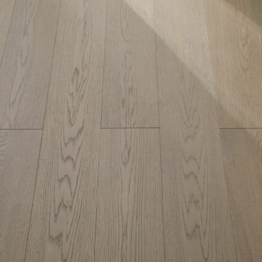 Vita 608 wire-brushed ash blonde European oak engineered wood flooring planks showing select grade.