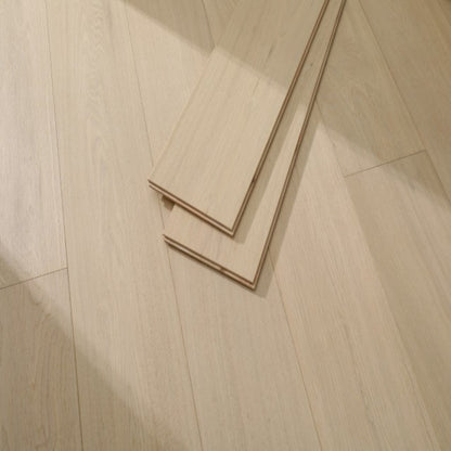 Close-up texture of brushed finish and UV lacquer on Vita 603 natural sand oak plank.