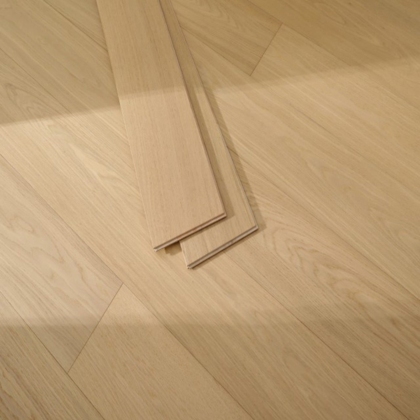 Close-up texture of brushed finish and UV lacquer on Vita 604 misted oak plank.