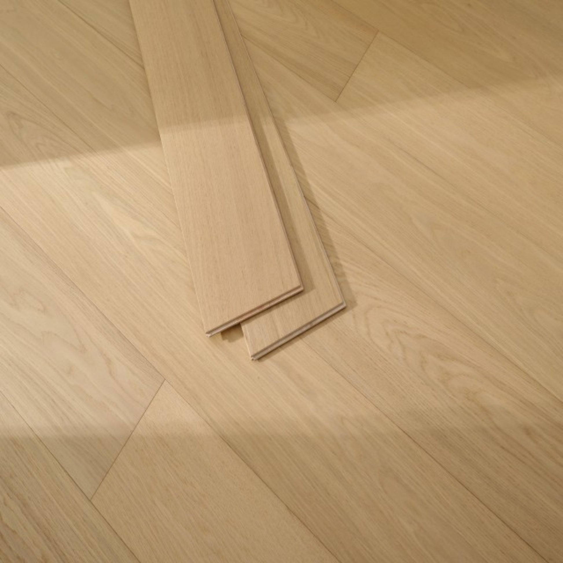 Close-up texture of brushed finish and UV lacquer on Vita 604 misted oak plank.