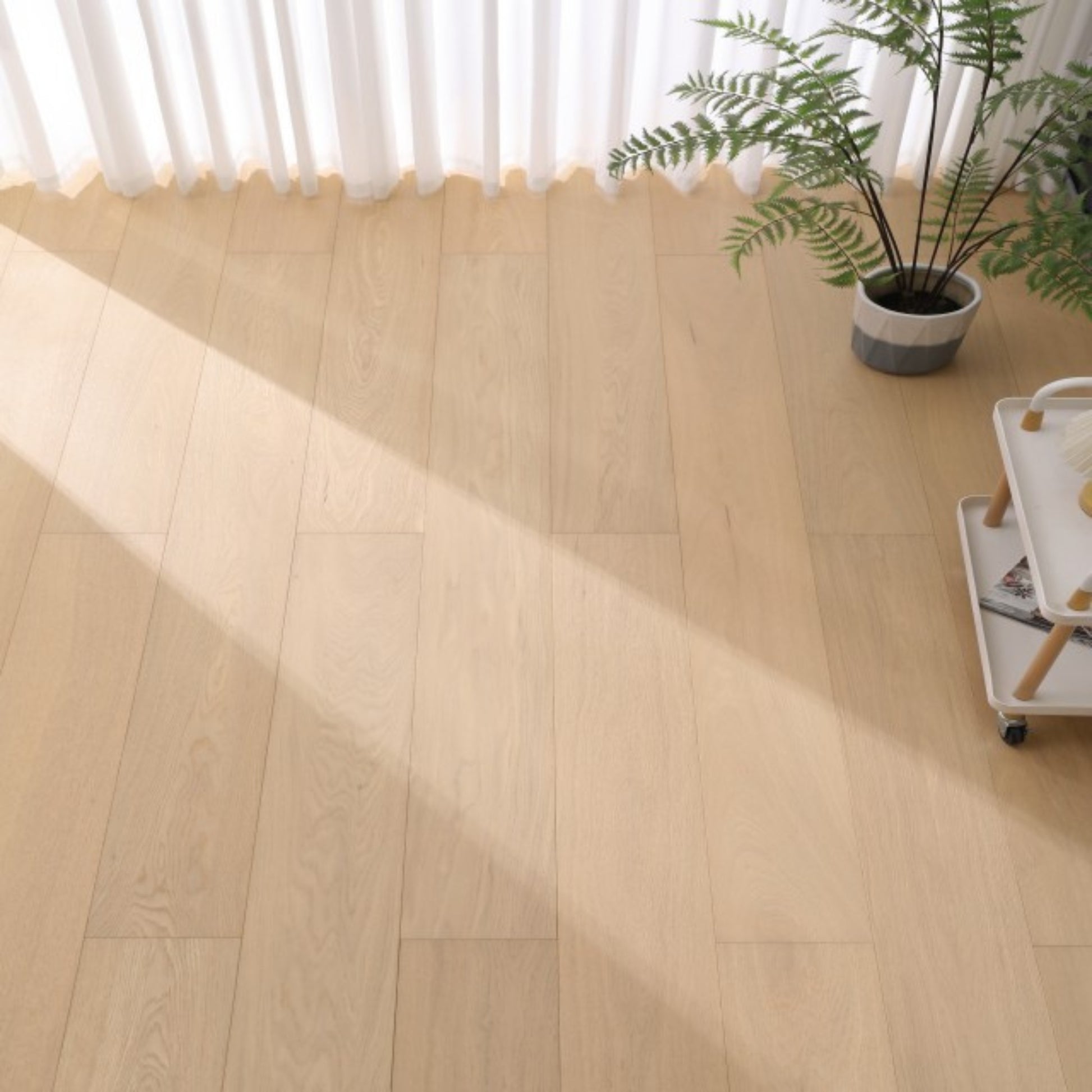 Close-up texture of brushed finish and UV lacquer on Vita 605 warm honey oak plank.