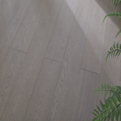 Close-up texture of brushed finish and UV lacquer on Vita 606 smoked taupe oak plank.