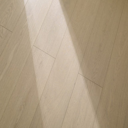 Close-up texture of brushed finish and UV lacquer on Vita 607 chestnut brown oak plank.