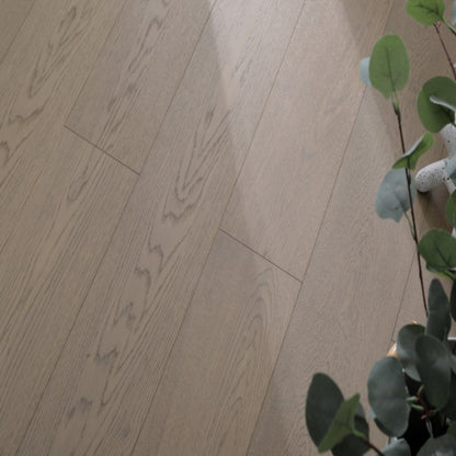 Close-up texture of brushed finish and UV lacquer on Vita 608 ash blonde oak plank.