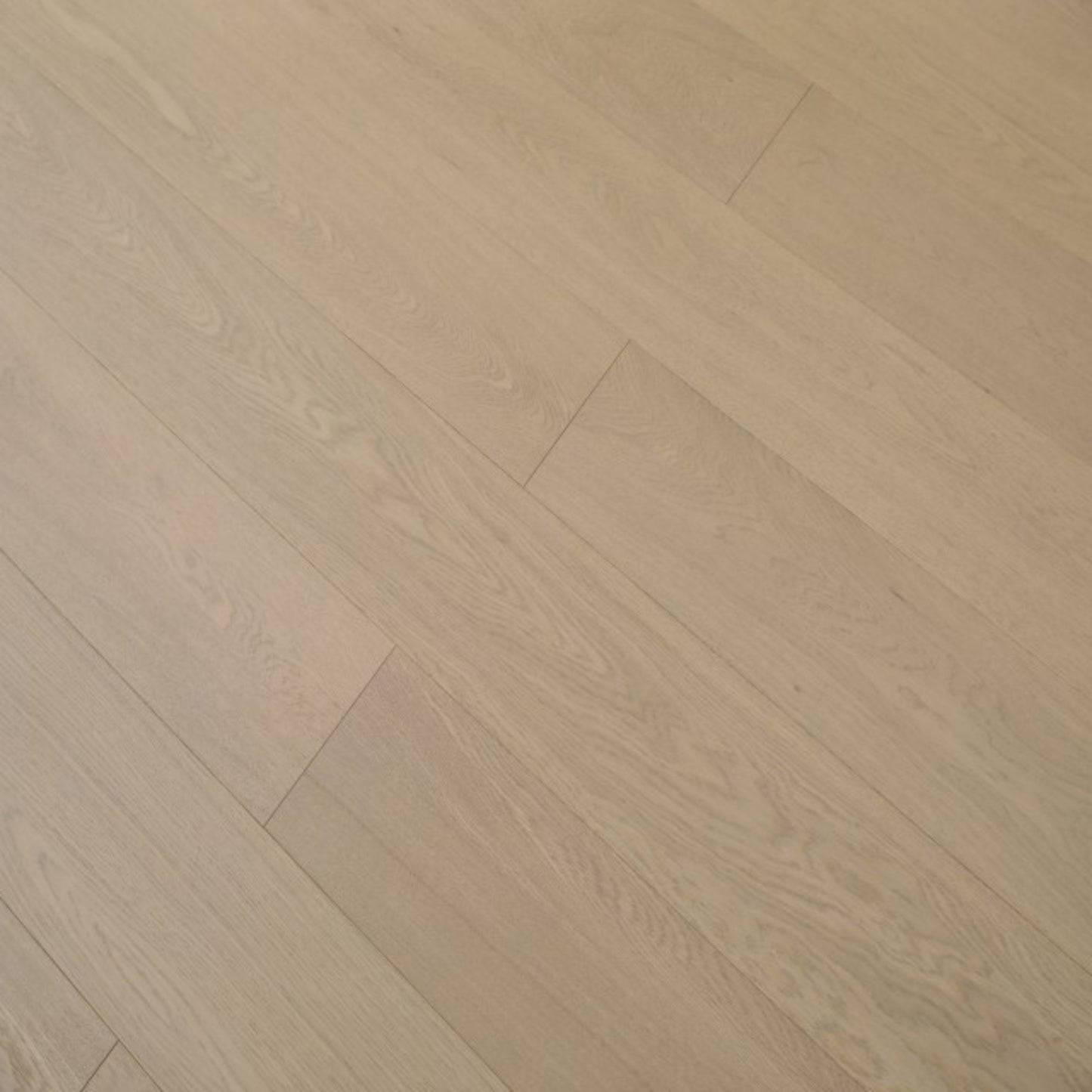 Vita 607 wire-brushed chestnut brown European oak engineered wood flooring planks showing select grade.
