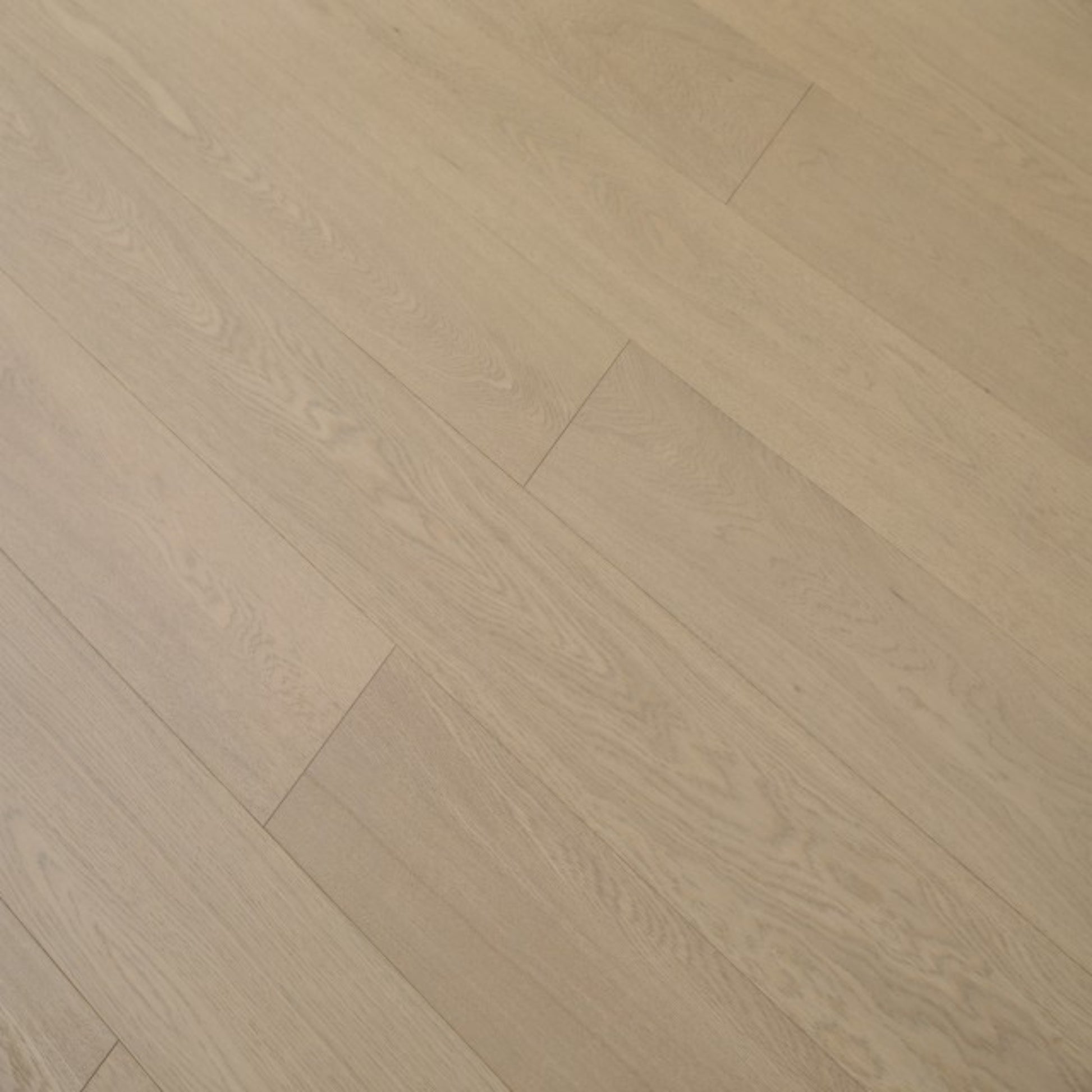 Vita 607 wire-brushed chestnut brown European oak engineered wood flooring planks showing select grade.