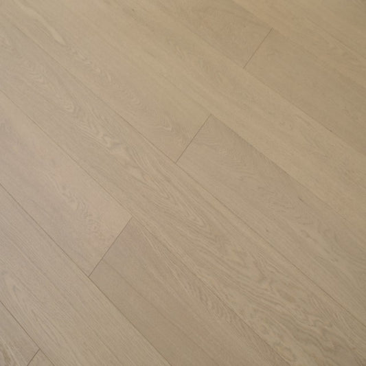 Vita 607 wire-brushed chestnut brown European oak engineered wood flooring planks showing select grade.