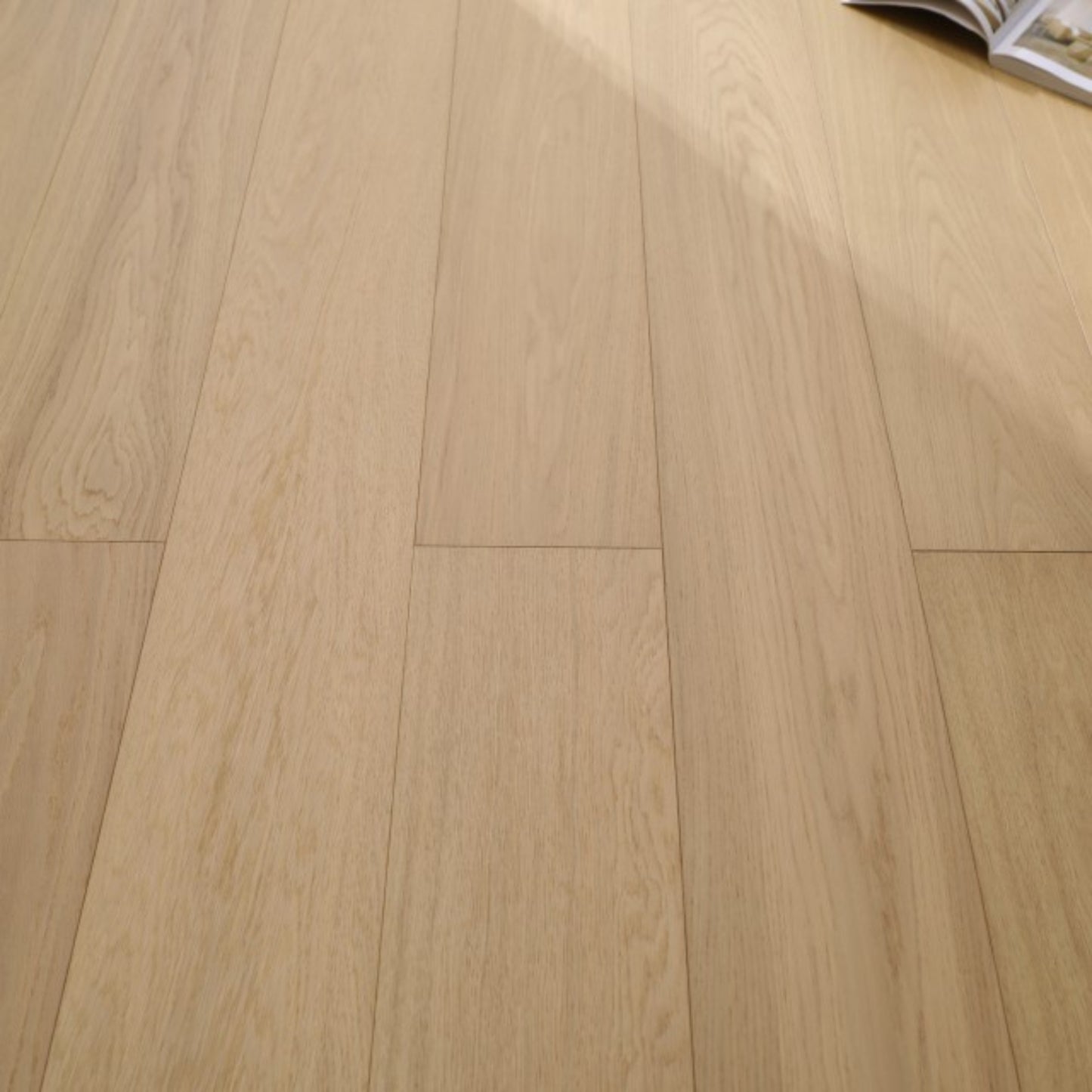 Vita 604 wire-brushed misted oak European engineered wood flooring planks showing select grade.