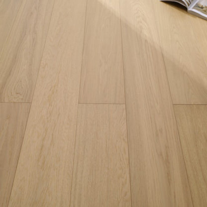 Vita 604 wire-brushed misted oak European engineered wood flooring planks showing select grade.