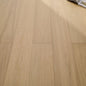 Vita 604 wire-brushed misted oak European engineered wood flooring planks showing select grade.