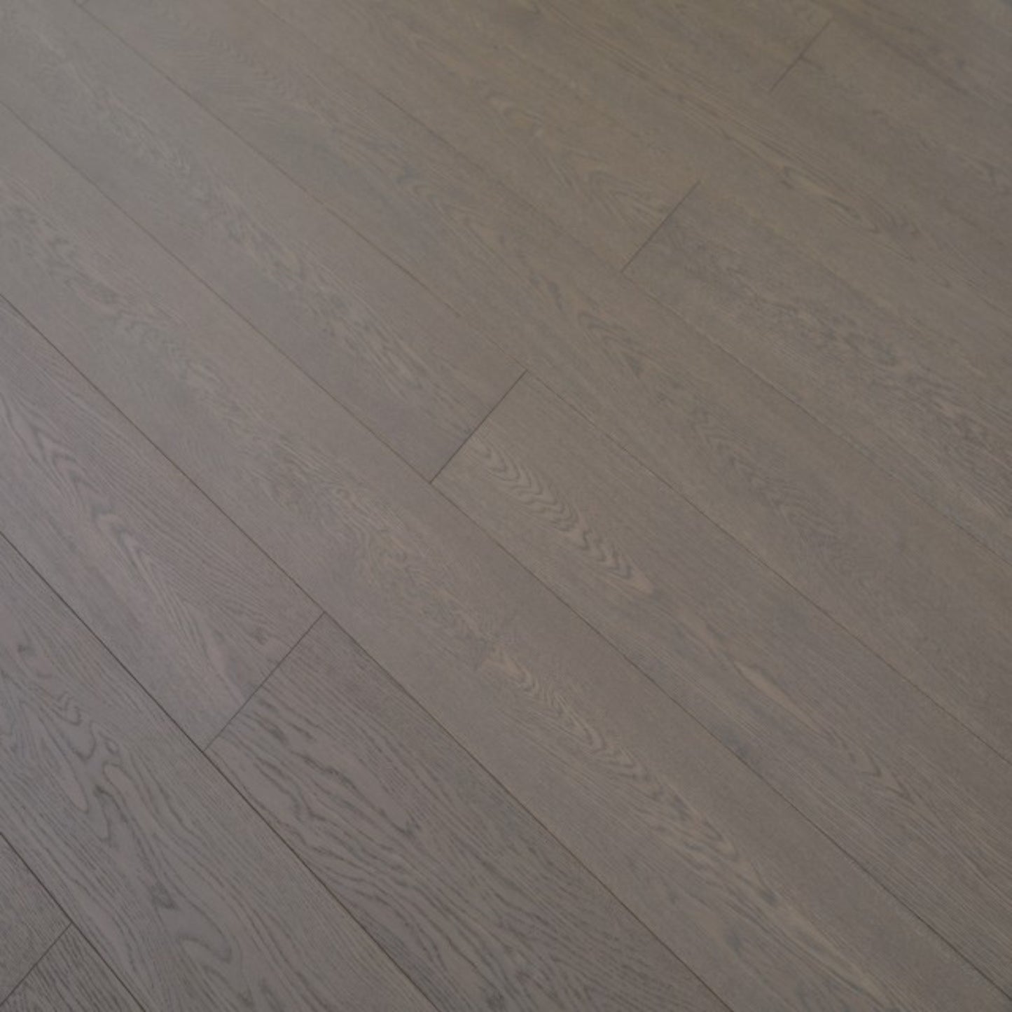 Vita 606 wire-brushed smoked taupe European oak engineered wood flooring planks showing select grade.
