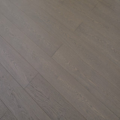 Vita 606 wire-brushed smoked taupe European oak engineered wood flooring planks showing select grade.
